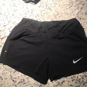 Nike Dri-Fit size XS shirts in black.  Like new.